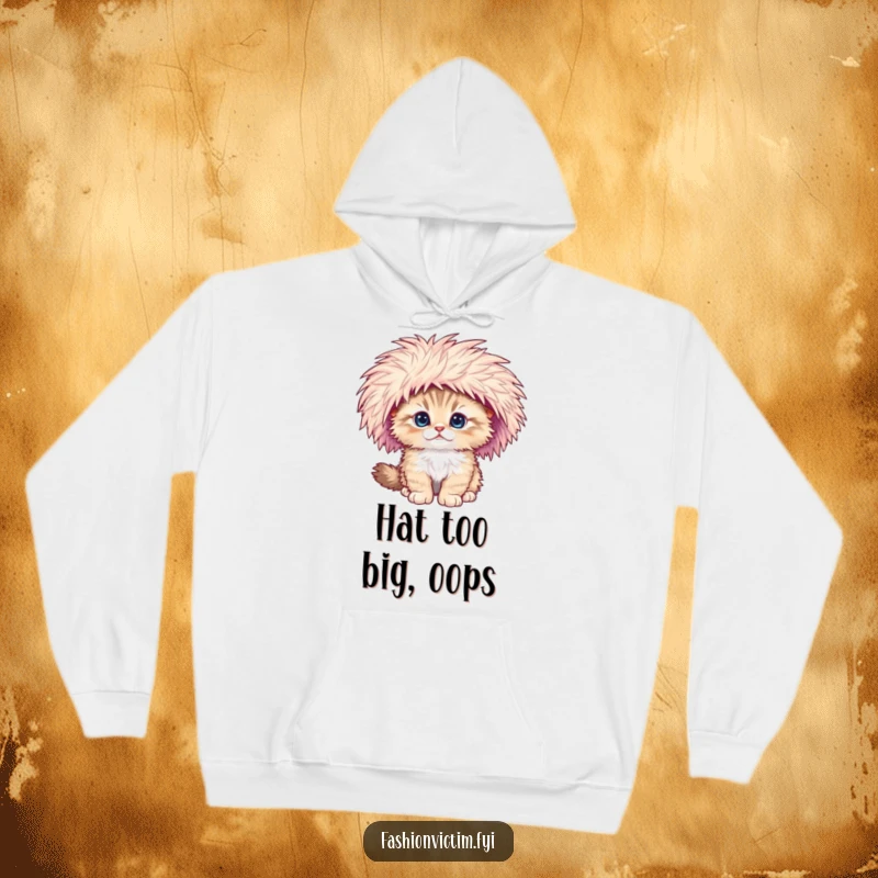 Funny hoodie depicting a fluffy kitten dramatically falling over, its ridiculously large feathered hat askew.
