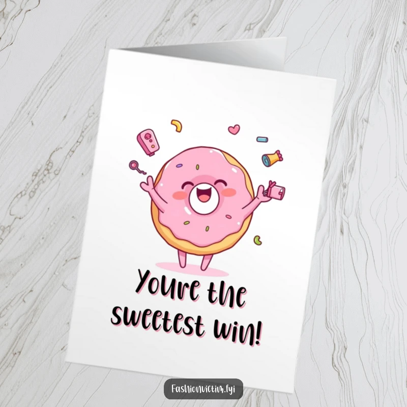 Free Printable Congratulations Card: A pink donut character joyfully juggles small items, celebrating achievements with playful energy.