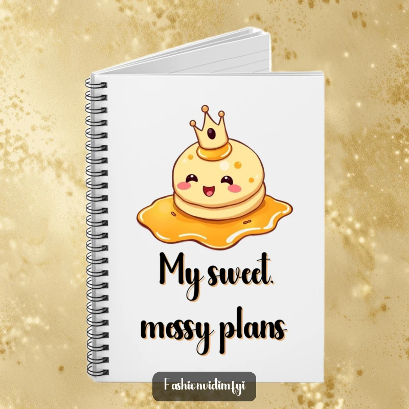 Funny pancake notebook, a cheerful pancake wearing a tiny crown, tripping in syrup, perfect for writing.